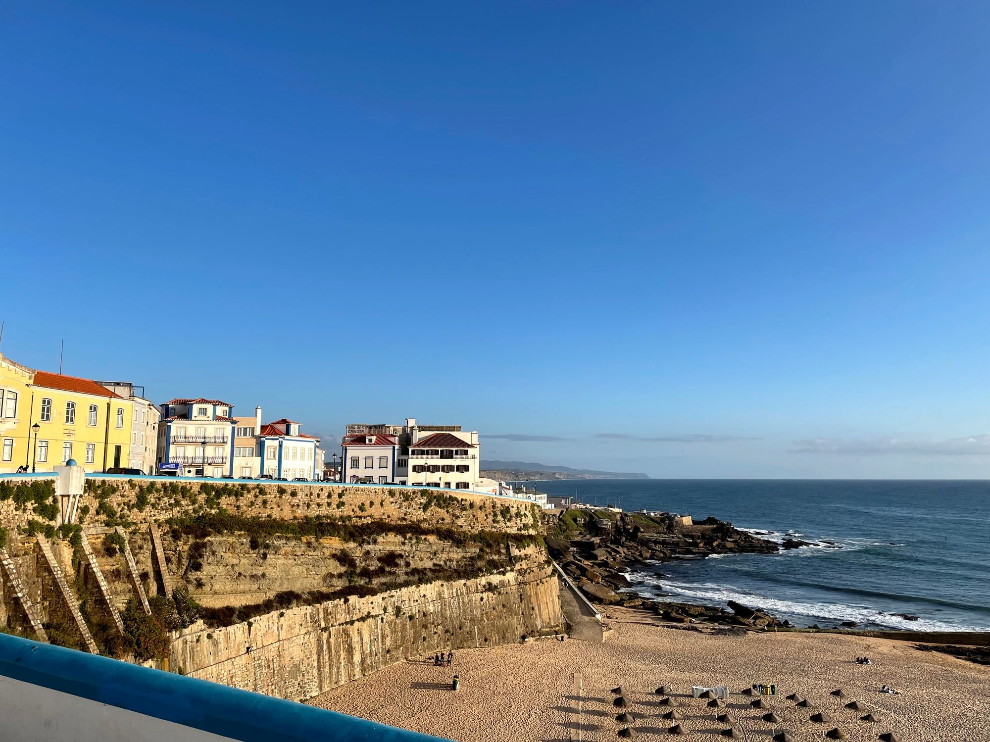 Colourful houses with seaview, beach, ocean, in Ericeira, Portugal