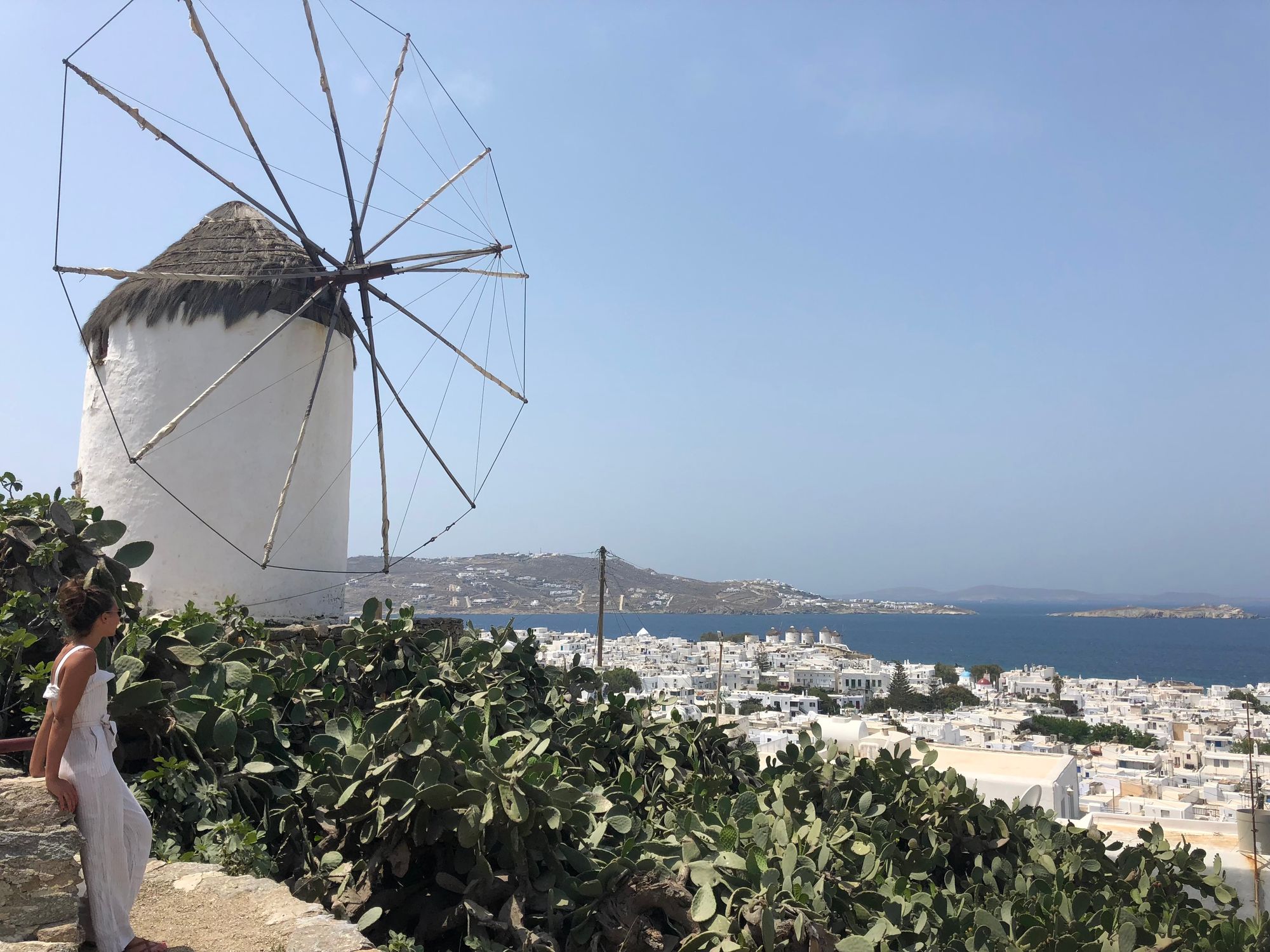 Windmills in Mykonos, Greece. White buildings. Island life. 